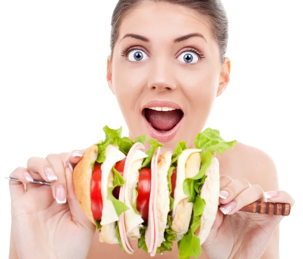 Young woman surprised by the size of a sandwich — Stock Photo, Image