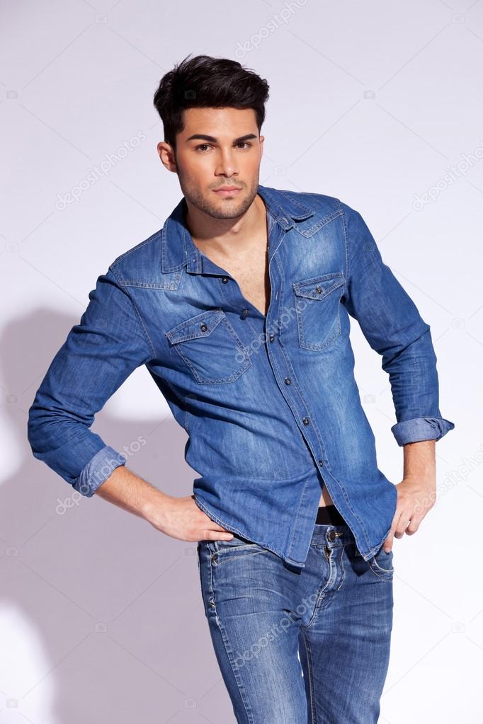 model wearing a casual jeans shirt posing