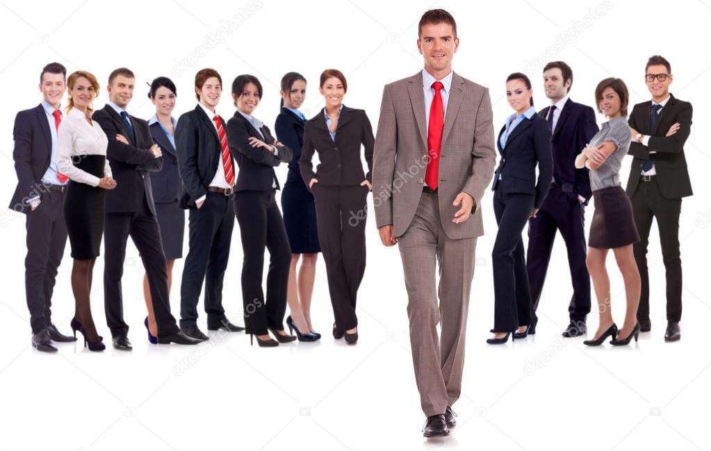 business man walking forward leading team