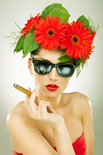 Sexy young woman with cigar — Stock Photo, Image