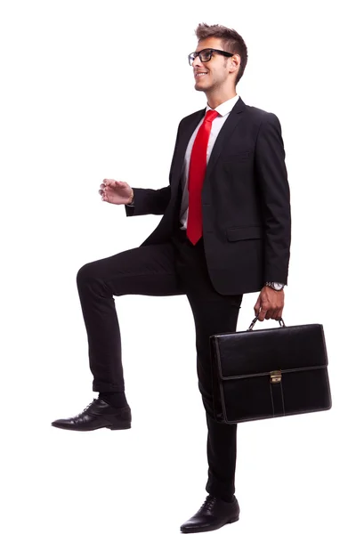 Business man stepping up — Stock Photo, Image