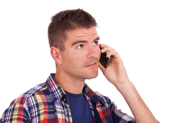 Casual jongeman op de telefoon — Stockfoto