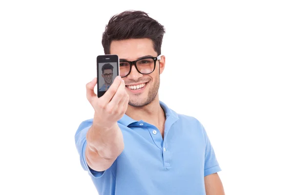 Casual man taking a photo of himself — Stock Photo, Image