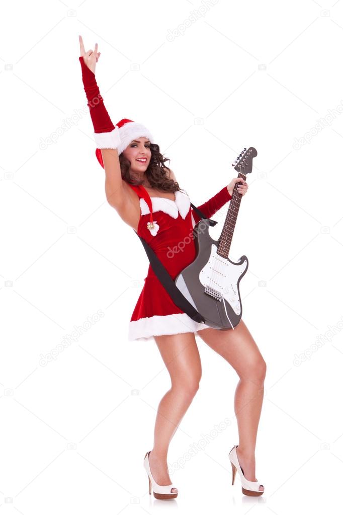 young santa woman playing a guitar