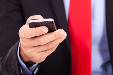 iş adamı holding smartphone