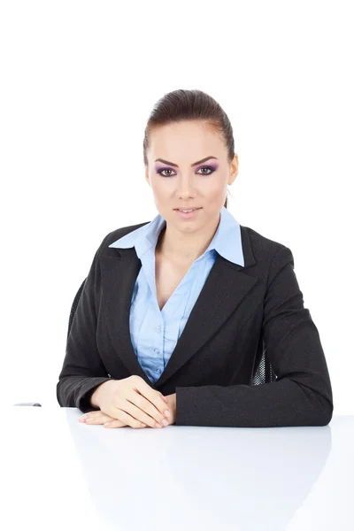Business woman sitting at her desk Stock Photo