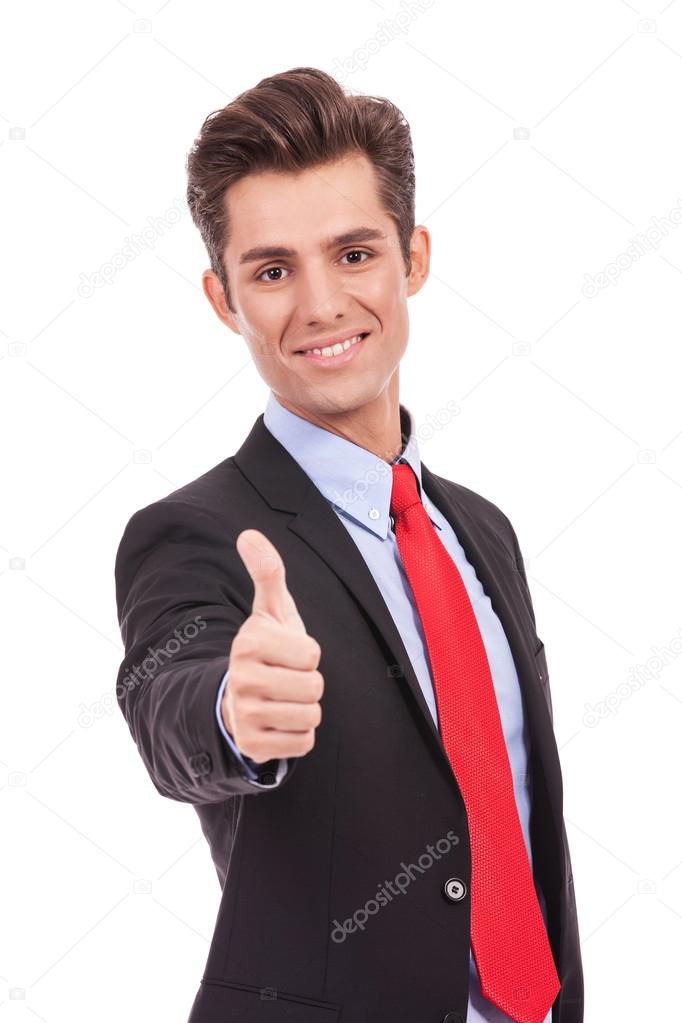 Happy business man going thumbs up