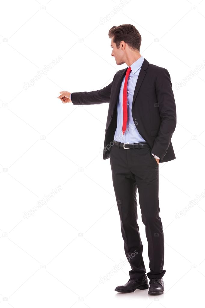 business man pointing at his back