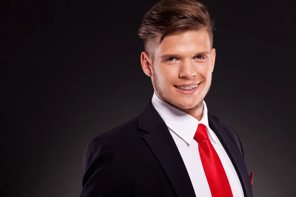 Young business man smiling — Stock Photo, Image