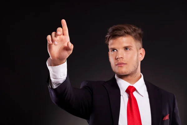 Business man pushing button — Stock Photo, Image