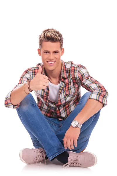 Casual man sitting thumbs up — Stock Photo, Image