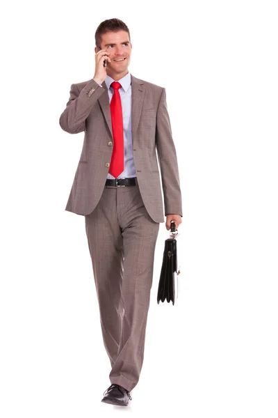 Business man with briefcase and phone — Stock Photo, Image