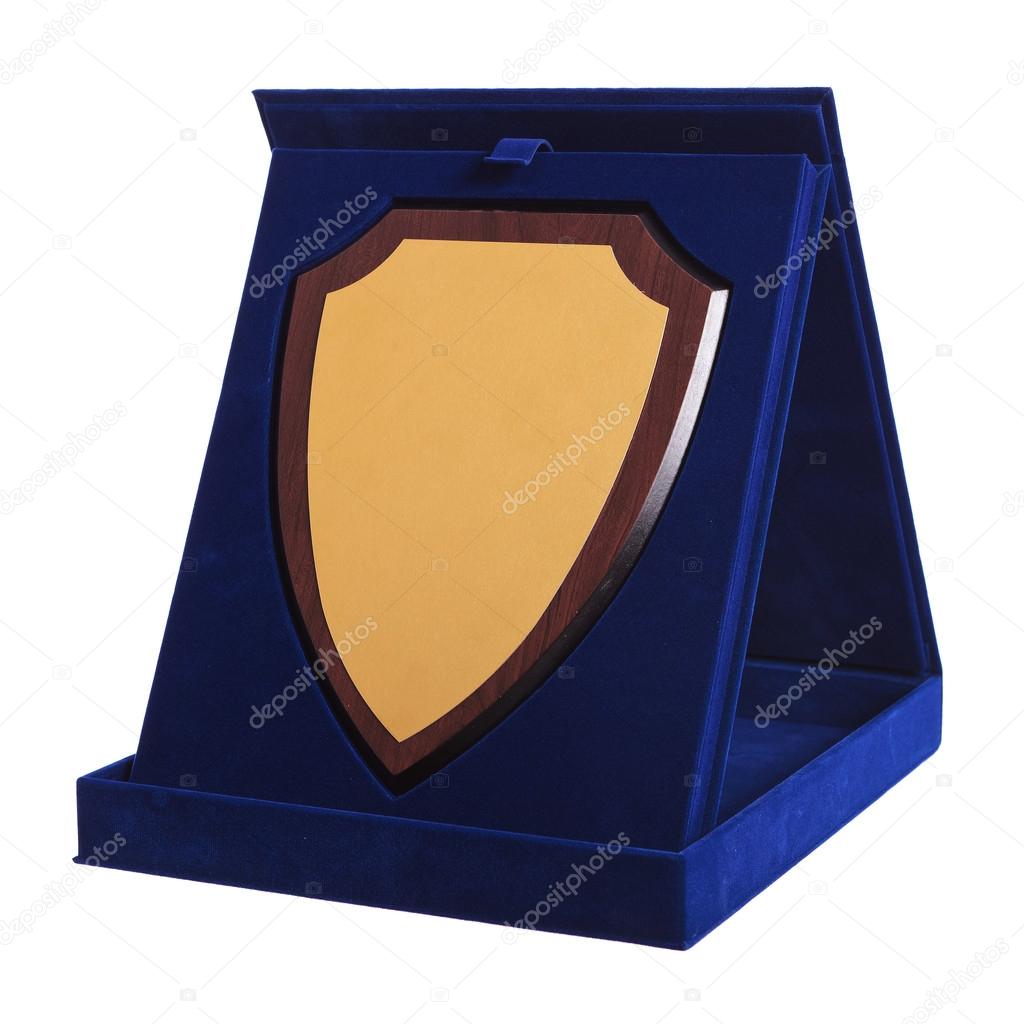 shield shaped trophy in a blue award box