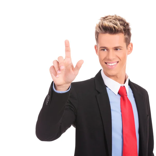 Businessman pushing an imaginary button — Stock Photo, Image