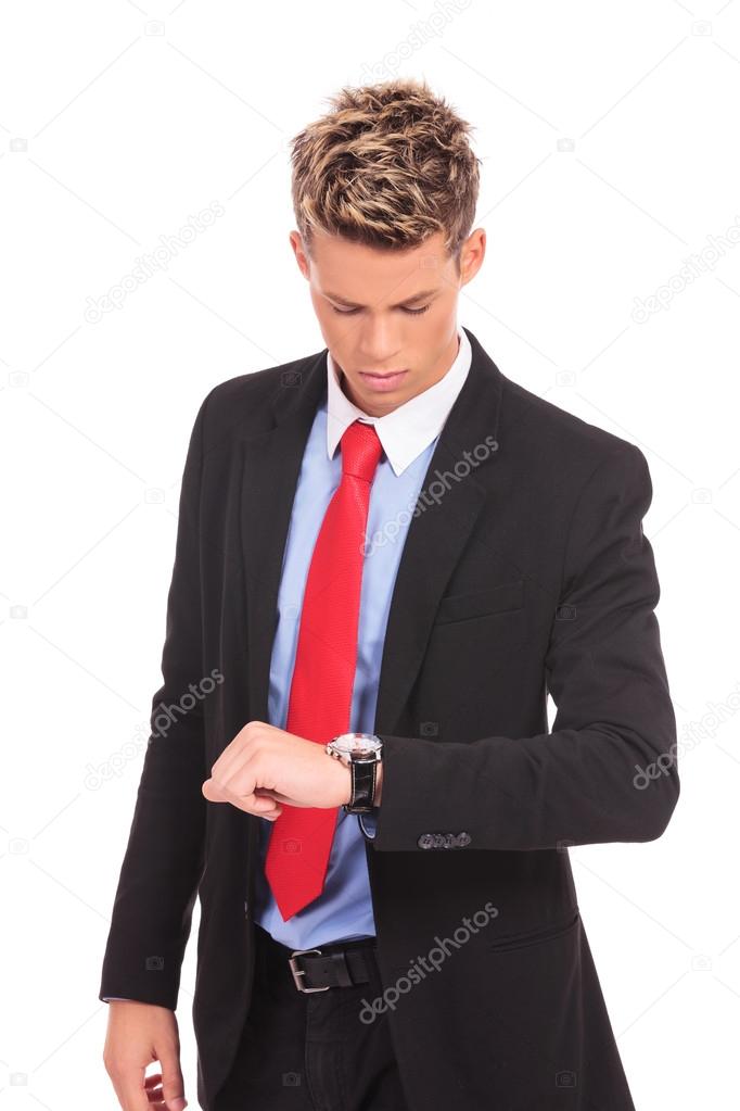 Businessman checking the time