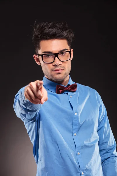 Fashion man wearing bow tie pointing — Stock Photo, Image