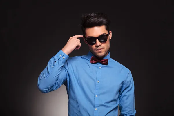 Fashion man wearing sunglasses thinking — Stock Photo, Image