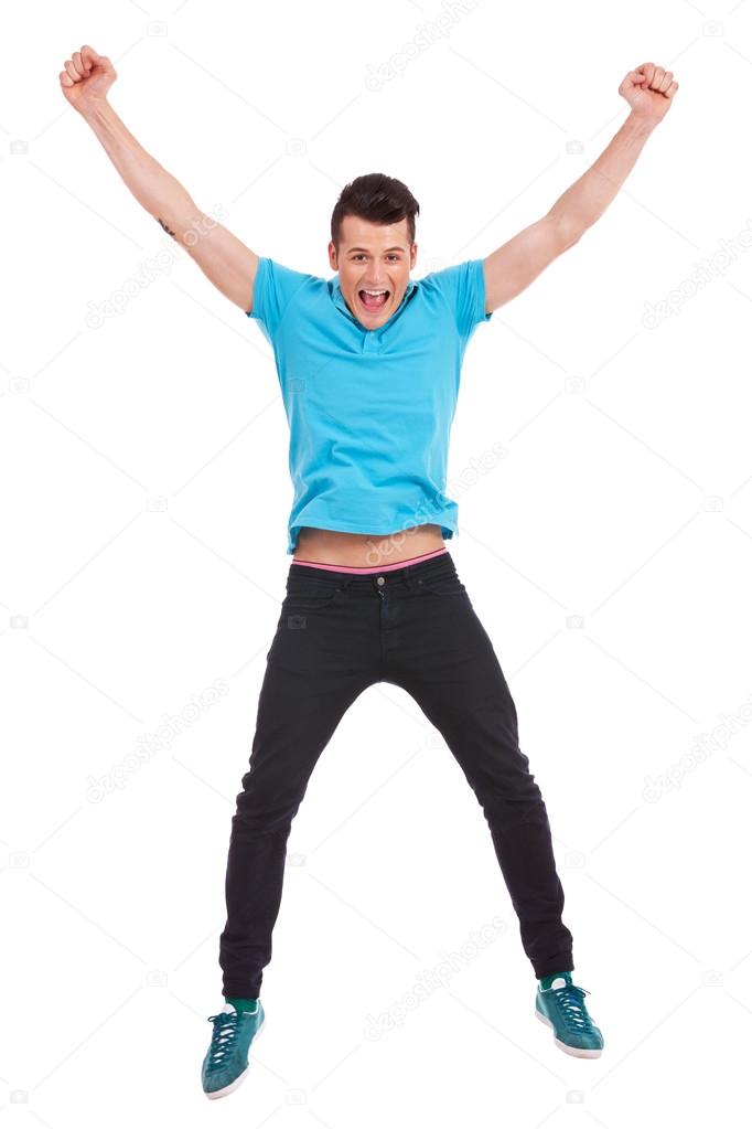 casual man jumping in air