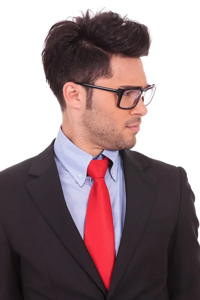 Business man looks doubtfully to side — Stock Photo, Image