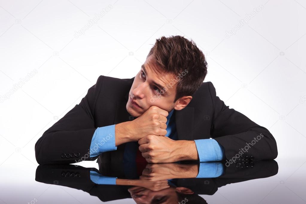dreamer man sitting at desk