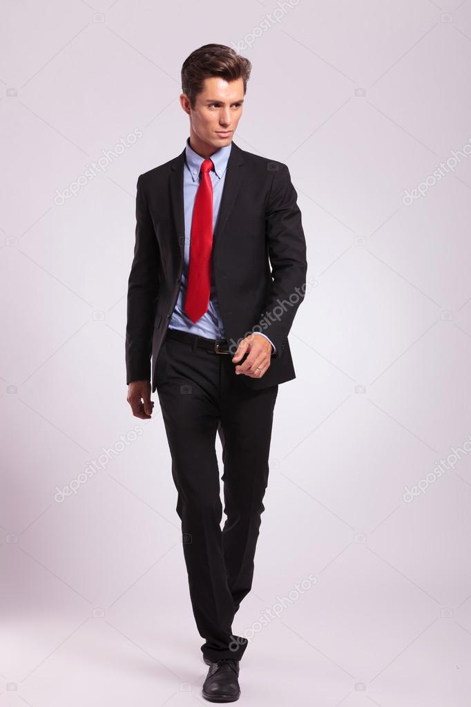Man In Suit Walking Forward