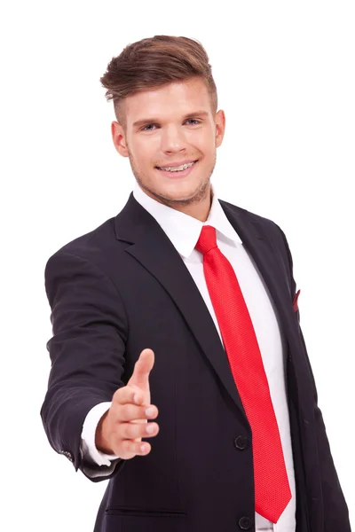 Business man offers handshake — Stock Photo, Image