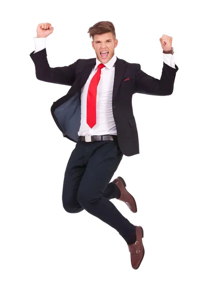 Homem de negócios pulando em êxtase — Fotografia de Stock