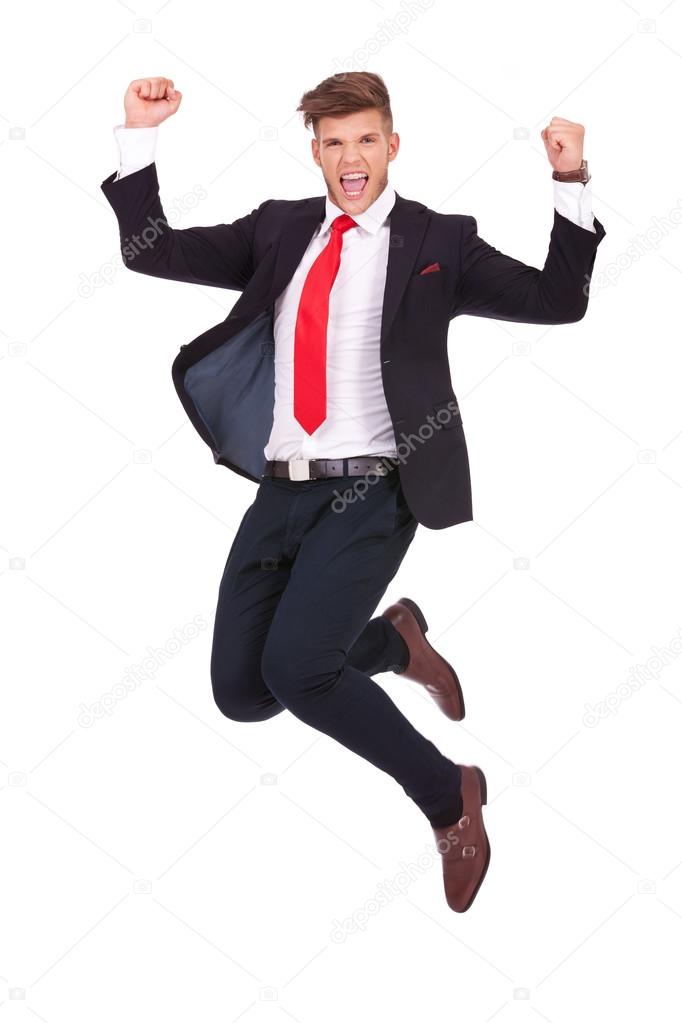business man jumping ecstatic
