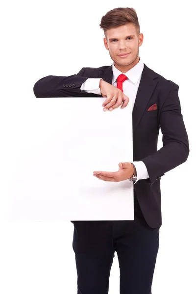 Business man presents board — Stock Photo, Image