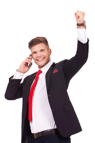 Business man on phone cheers — Stock Photo, Image