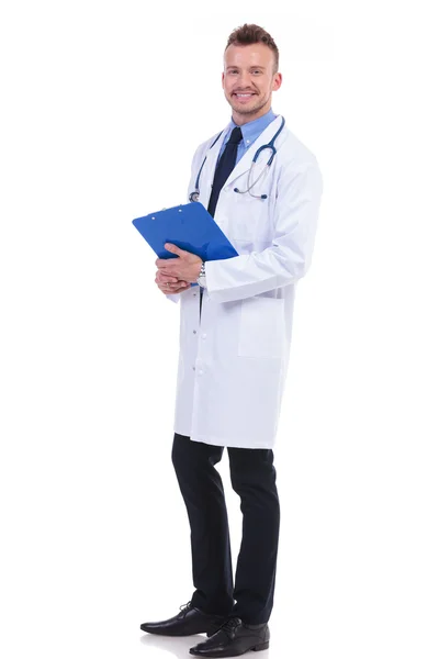 Young doctor holding his notepad — Stock Photo, Image