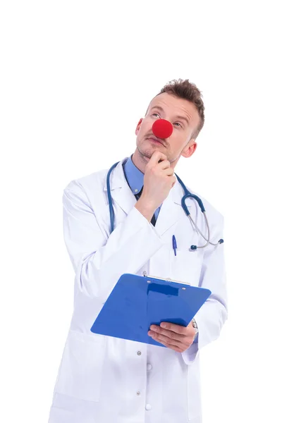 Medico clown falso pensoso con naso rosso — Foto Stock