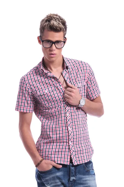 Casual man unbuttoning shirt — Stock Photo, Image