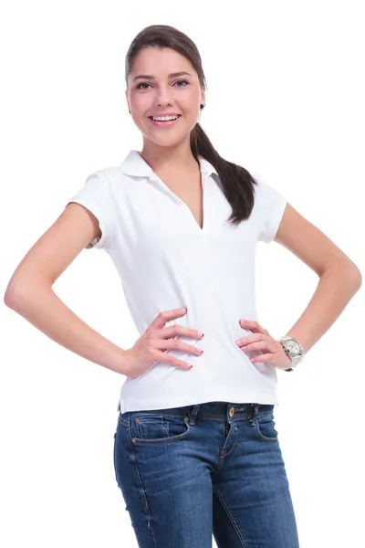 Casual woman with hands on hips — Stock Photo, Image