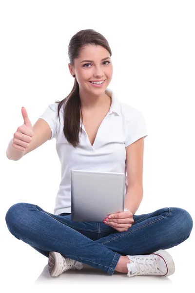 Casual woman sits & pad & ok sign — Stock Photo, Image