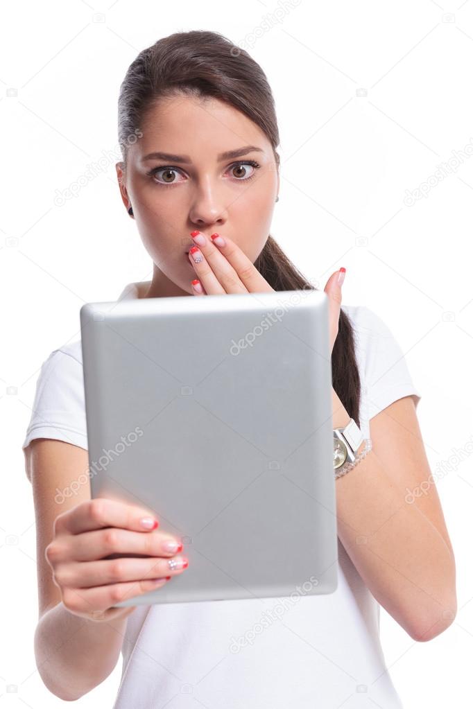 casual woman scared with tablet