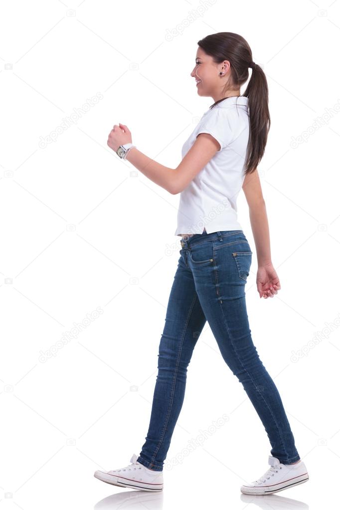 casual woman walks to side