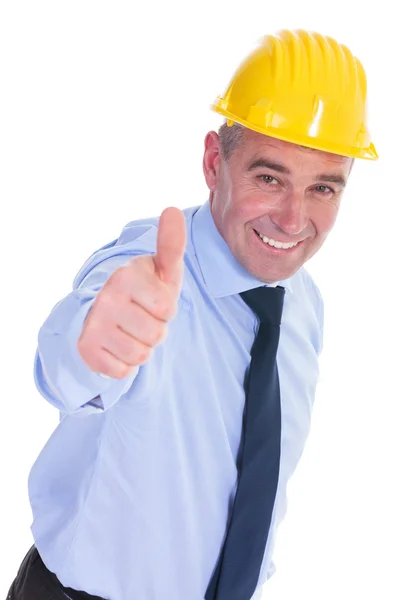 Old engineer shows thumbs up and smiles — Stock Photo, Image