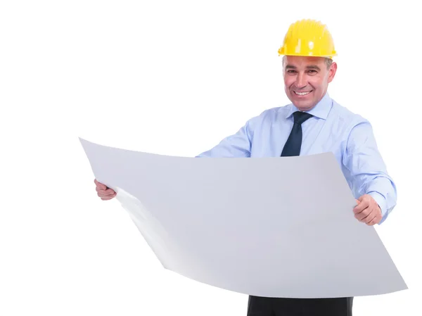 Old engineer holds project and smiles — Stock Photo, Image