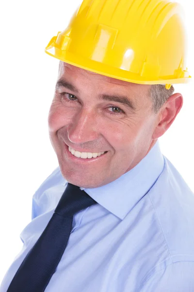 Old engineer smiles for the camera — Stock Photo, Image