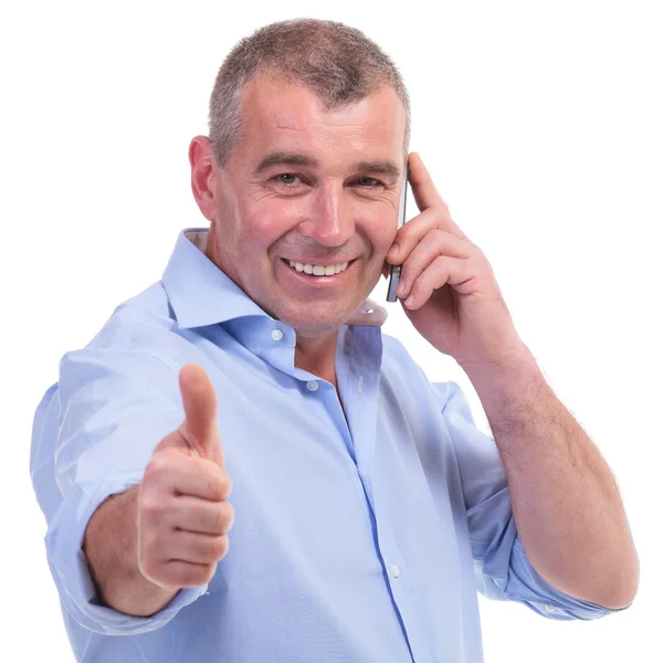 Casual middle aged man shows thumb up — Stock Photo, Image