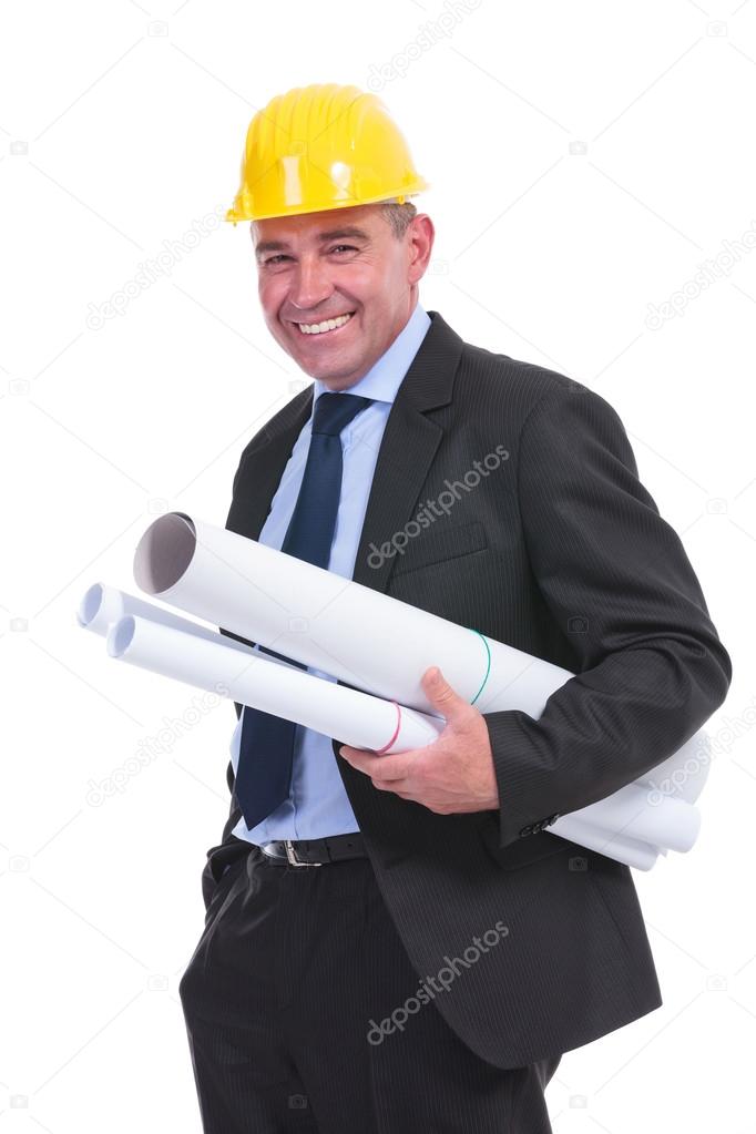 old engineer holding his drafts