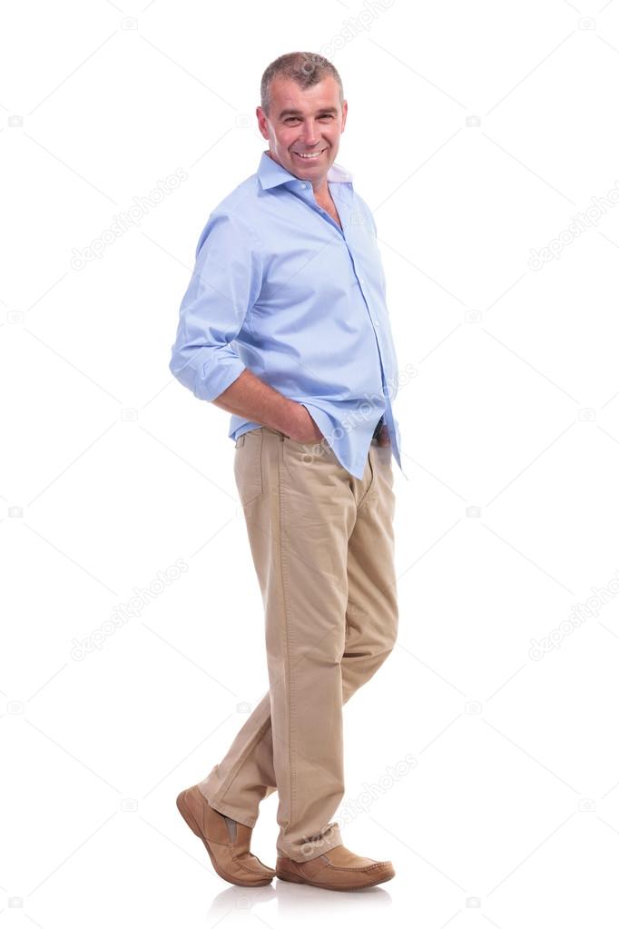 casual middle aged man poses with smile