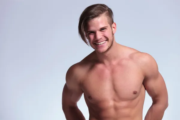 Topless young man shows a big smile — Stock Photo, Image
