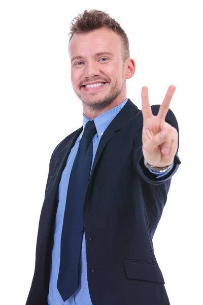 Business man shows victory sign — Stock Photo, Image