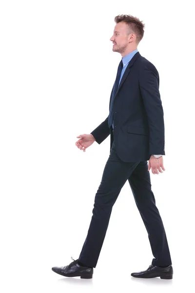 Business man walks to side — Stock Photo, Image