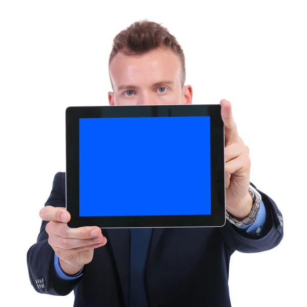 Business man presents empty screen tablet — Stock Photo, Image