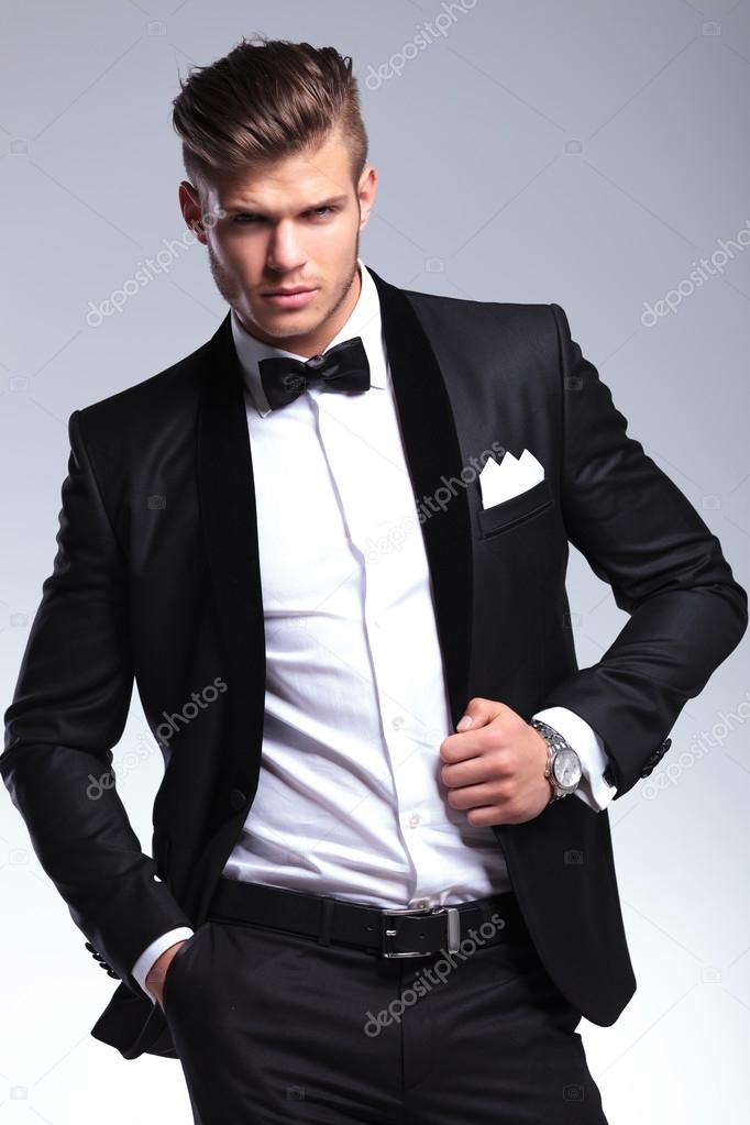 business man with hand in pocket and on jacket