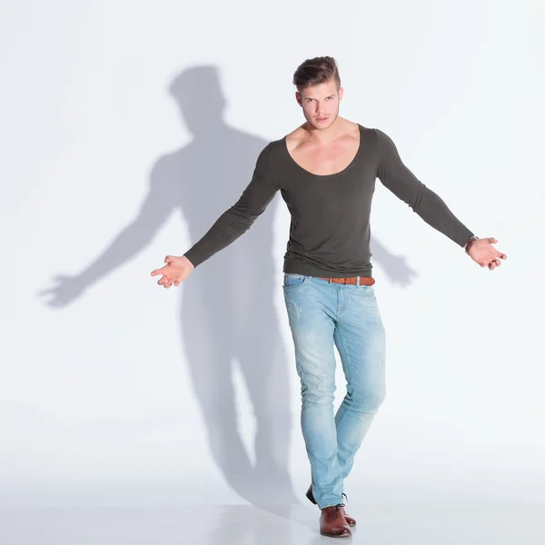 Casual man extends his arms in rage — Stock Photo, Image