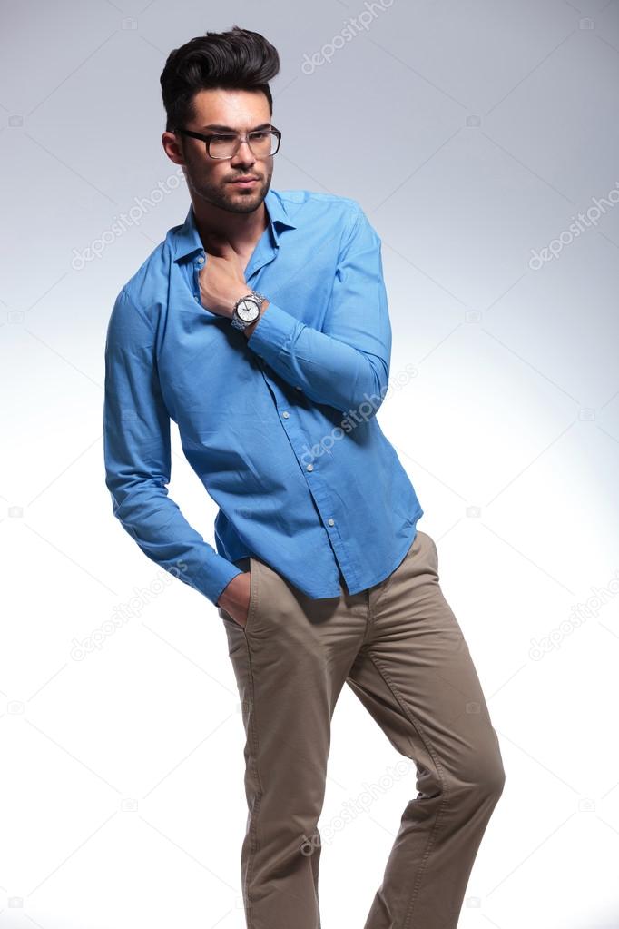 casual man with hand in pocket and shirt